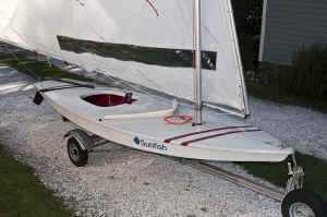 Trailex Sunfish or similar small sailboat Trailer.   The SUT-220-S is the latest model available. (formerly SUT-200-S)